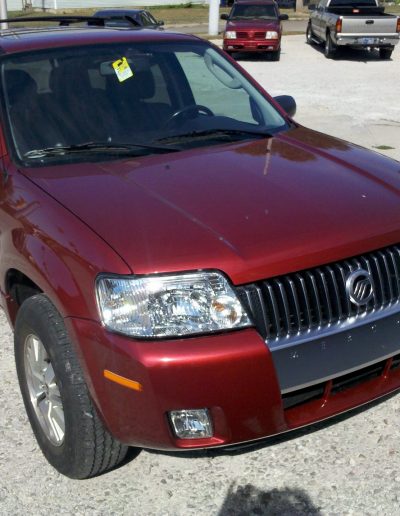 After photos of a red SUV repaired by Blackburn Collision Center